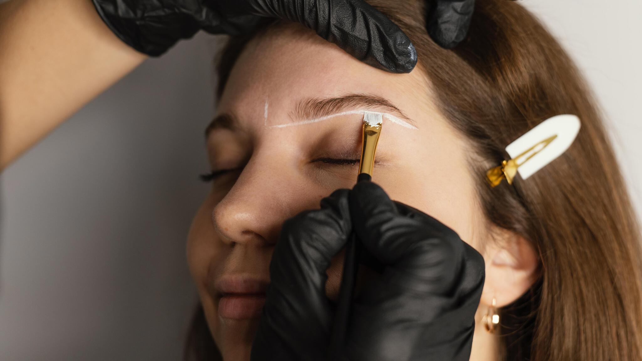 A qualified microblading artist